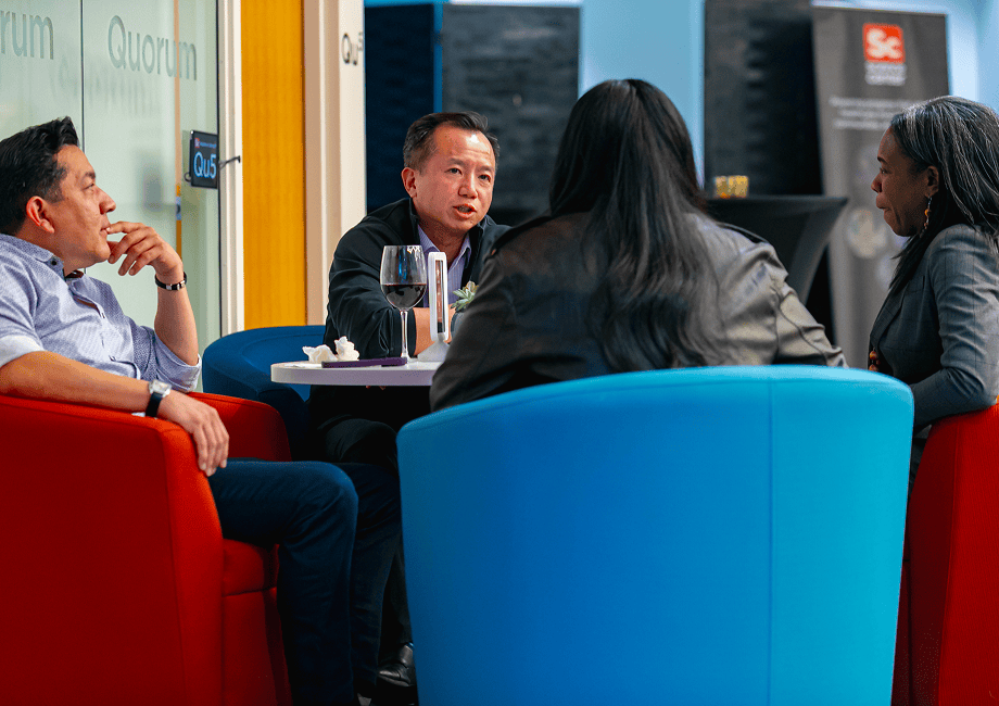 Capital Readiness Program Investors-in-Residence and participants engage in conversation around a table