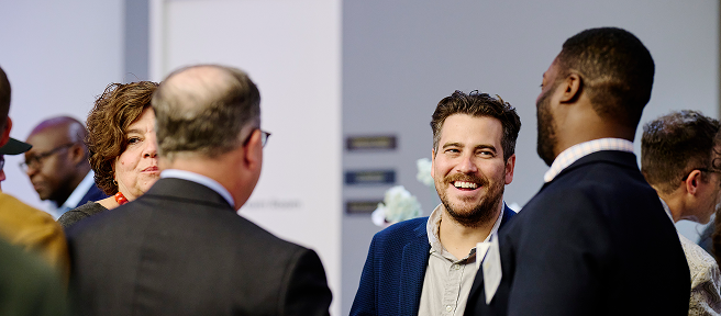 Two professional men engaged in conversation