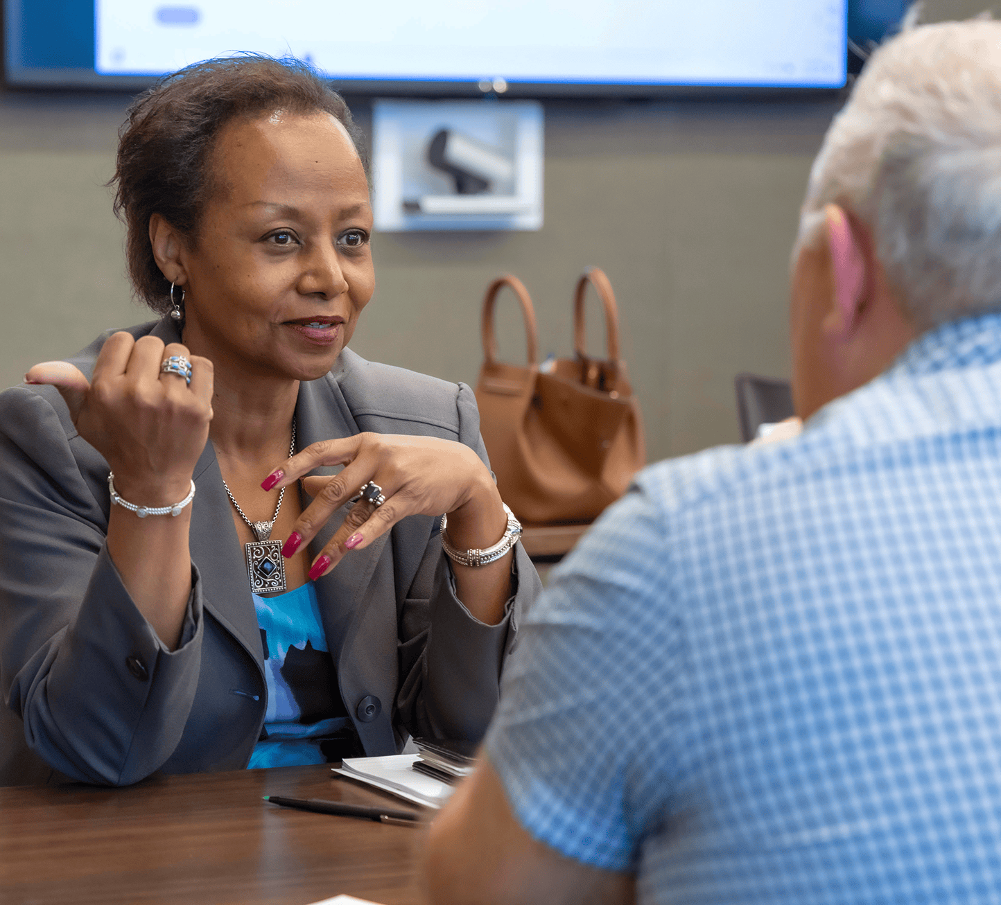 Professional woman engaged in conversation with a mentor